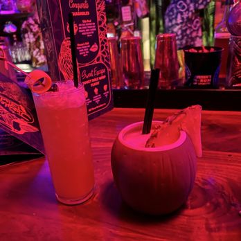 The Jungle Bird - Left : Glass Fin / Right : Piña Colada - Tiki Bars Near Me - Sacramento, California The Jungle Bird - Left : Glass Fin / Right : Piña Colada - Tiki Bars Near Me - Sacramento, California