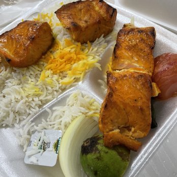 Farid Restaurant - Taking a close up look of this salmon grilled perfectly. It literally melted in my mouth. - Persian/Iranian Near Me - Los Angeles, California Farid Restaurant - Taking a close up look of this salmon grilled perfectly. It literally melted in my mouth. - Persian/Iranian Near Me - Los Angeles, California