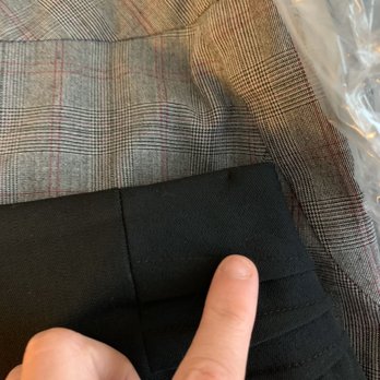 DropMint - Hole in skirt from safety pins. - Laundry Services Near Me