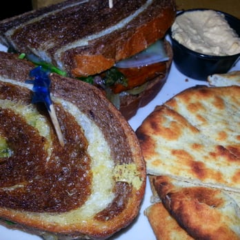 Crow's Nest - The Mast sandwich, side of pita and hummus - Breakfast & Brunch Near Me - Kalamazoo, Michigan Crow's Nest - The Mast sandwich, side of pita and hummus - Breakfast & Brunch Near Me - Kalamazoo, Michigan