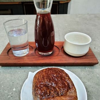Sey Coffee - Large drip coffee and a chocolate croissant - Coffee Roasteries Near Me - Brooklyn, New York Sey Coffee - Large drip coffee and a chocolate croissant - Coffee Roasteries Near Me - Brooklyn, New York