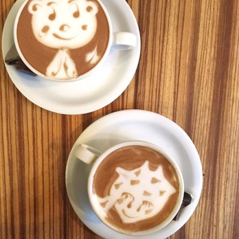 Moore Coffee Shop - A bear, and i think a giraffe - Coffee & Tea Near Me - Seattle, Washington Moore Coffee Shop - A bear, and i think a giraffe - Coffee & Tea Near Me - Seattle, Washington