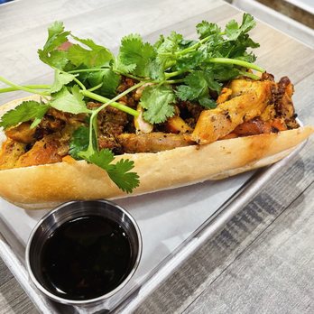 Phở Hub - a sandwich with meat and vegetables - Vietnamese Near Me - Austin, Texas