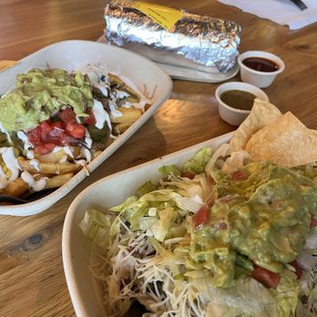 Guzman y Gomez - Schaumburg - Nacho Fries and Veggie Bowl (Cali Burrito in the background) - Mexican Near Me - Schaumburg, Illinois Guzman y Gomez - Schaumburg - Nacho Fries and Veggie Bowl (Cali Burrito in the background) - Mexican Near Me - Schaumburg, Illinois