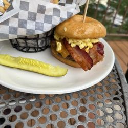 Marina Cafe - Donut burger with bacon and eggs.