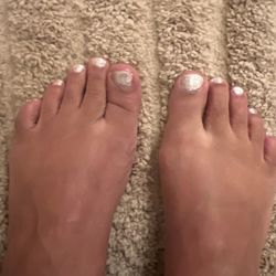 Silver Nail & Tan - This is the pedicure look at the college very closely. This is unacceptable and unprofessional.