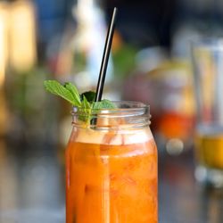 Electric Owl - Vodka & juice, turmeric infused vodka, orange, carrot, passion fruit, galliano