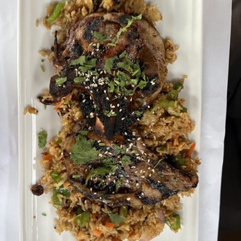 Thithi's Restaurant - Pork Chops with Hawaiian Fried Rice - Thai Near Me - Evergreen Park, Illinois Thithi's Restaurant - Pork Chops with Hawaiian Fried Rice - Thai Near Me - Evergreen Park, Illinois