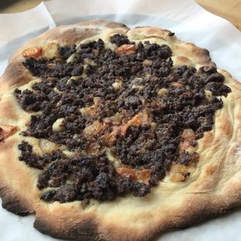 Ghada Have It & Ghada Party - Meat pie $3.50 - crisp dough topped with rich, flavorful meat - Food Trucks Near Me - Niagara Falls, New York