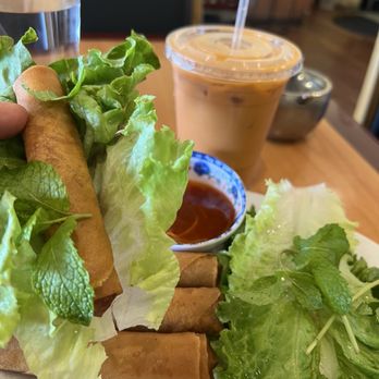 Lakeside Pho & Grill - Wrapping up the egg rolls! W/ Thai tea on the side. - Vietnamese Near Me - Lakeside, California Lakeside Pho & Grill - Wrapping up the egg rolls! W/ Thai tea on the side. - Vietnamese Near Me - Lakeside, California