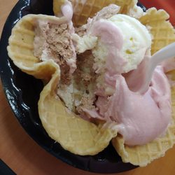 Scoops Homemade Ice Cream Parlor - Raspberry sherbet, heath, almond joy, and coconut in a waffle bowl