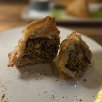 G.O.A.T. Room - Inside peek of lamb samosa - Indian Near Me - Washington, DC, District of Columbia G.O.A.T. Room - Inside peek of lamb samosa - Indian Near Me - Washington, DC, District of Columbia