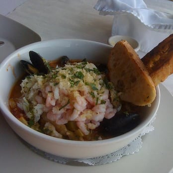 The Wharf - Cioppino, topped with bay shrimps and crab. - Seafood Near Me - Fort Bragg, California