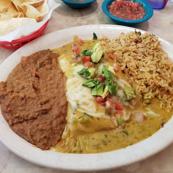 Chuy's - Monday's lunch special: chicken enchilada with avocados - Tex-Mex Near Me - Plano, Texas Chuy's - Monday's lunch special: chicken enchilada with avocados - Tex-Mex Near Me - Plano, Texas