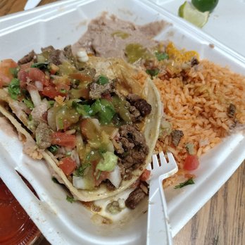 Ramires Mexican Food - Carne Asada Tacos Combo Plate Comes with Spanish rice, refried beans, & verde & rojo sauce, as well as lime wedges on the side - Food Trucks Near Me - Belgrade, Montana Ramires Mexican Food - Carne Asada Tacos Combo Plate Comes with Spanish rice, refried beans, & verde & rojo sauce, as well as lime wedges on the side - Food Trucks Near Me - Belgrade, Montana