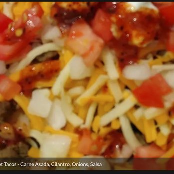 Rivera's Deli N' Dogs - close up of a taco salad - Street Vendors Near Me Rivera's Deli N' Dogs - close up of a taco salad - Street Vendors Near Me