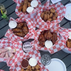 The Dog House Bar and Grill - Mini donuts, gochuchung wings, bourbon wings, maple bourbon wings, cheese curds, mac n cheese bites, pickle rolls.