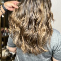 Just Your Beauty Hair Studio - Champagne balayage features blonde and beige tones for a natural, sun-kissed look that adds depth and elegance.