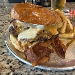 Double bacon, smash burger with garlic aïoli and cheddar cheese.