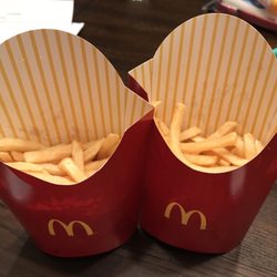 McDonald's - Ordered two large fries and this is what we got when I got home and looked in the bag. On top of that they were old and soggy. Ewww