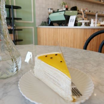 La Plume Bakery & Cafe - a slice of cake on a plate - Cafes Near Me - Houston, Texas La Plume Bakery & Cafe - a slice of cake on a plate - Cafes Near Me - Houston, Texas
