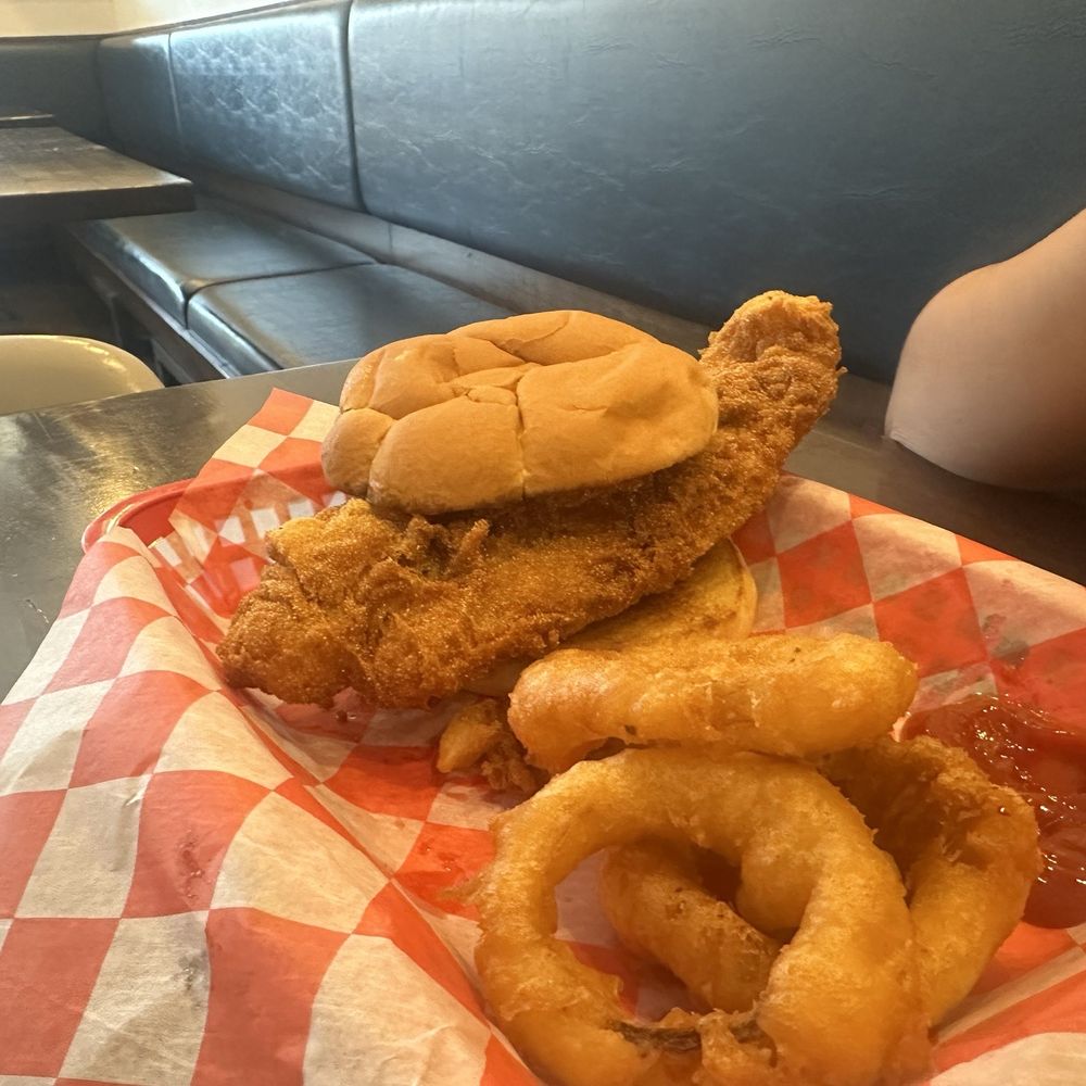 Beer battered fish sandwich! So big so good! Beer battered fish sandwich! So big so good!