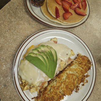 My Garden Cafe - Crab omelet with hasbrowns and pancakes with strawberries added extra. - Breakfast & Brunch Near Me - Modesto, California My Garden Cafe - Crab omelet with hasbrowns and pancakes with strawberries added extra. - Breakfast & Brunch Near Me - Modesto, California