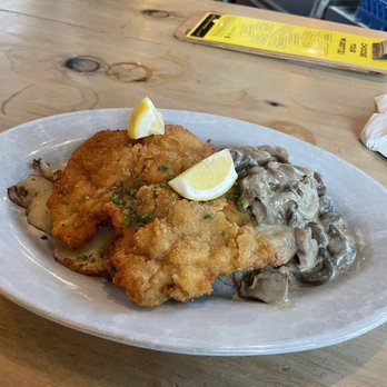 Willkommen - Schnitzel: Thinly sliced, breaded pork / warm potato salad / mushroom gravy. - German Near Me - San Francisco, California Willkommen - Schnitzel: Thinly sliced, breaded pork / warm potato salad / mushroom gravy. - German Near Me - San Francisco, California