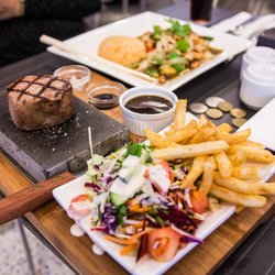 Hotel Monier - small hot rock steak and two wok meals as served to customer