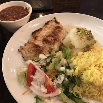 Sofrito Latin Cafe - Pollo a la plancha with yellow rice and red beans with yuca and salad. Very good - Latin American Near Me - Orlando, Florida Sofrito Latin Cafe - Pollo a la plancha with yellow rice and red beans with yuca and salad. Very good - Latin American Near Me - Orlando, Florida
