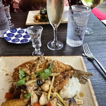 La Moon - Ginger Fish  Fried branzino with an in-house special ginger sauce, mushrooms, and onions We were also given complimentary mango sakes! - Vietnamese Near Me - Atlanta, Georgia