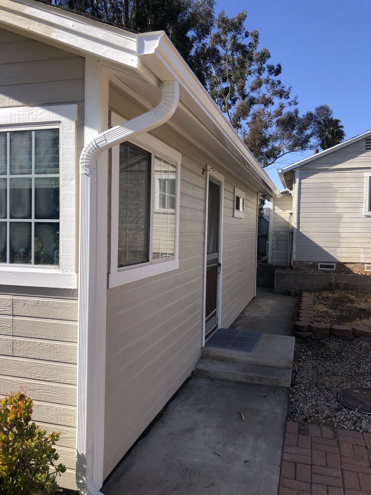 Slide of Escamilla’s Roofing and Rain Gutters