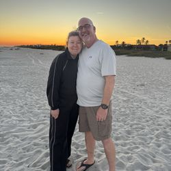 Sanibel Moorings Condominium Resort - Two very happy people during sunset in paradise.