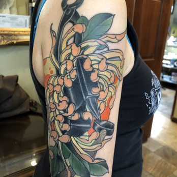 Unbreakable Tattoo - Anvil, hammer and tongs enveloped by chrysanthemum - Tattoo Near Me - Studio City, California