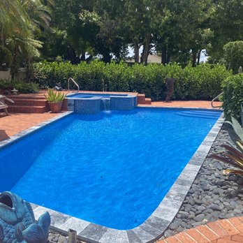 Top Notch Pools - My new remodel pool. Glass tiles and travertine - Pool & Hot Tub Service Near Me - Margate, Florida