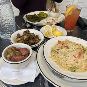 La Cour Kitchen & Bar - Creole Linguini, herb potatoes, and Brussels with candied pecans. - French Near Me - Jackson, Mississippi La Cour Kitchen & Bar - Creole Linguini, herb potatoes, and Brussels with candied pecans. - French Near Me - Jackson, Mississippi