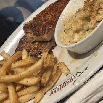 LongHorn Steakhouse - Cowboy Pork Chops with Seasoned French Fries and Steakhouse Mac & Cheese - Steakhouses Near Me - Orlando, Florida LongHorn Steakhouse - Cowboy Pork Chops with Seasoned French Fries and Steakhouse Mac & Cheese - Steakhouses Near Me - Orlando, Florida