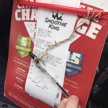 Smoothie King - a hand holding a pen and a piece of paper - Juice Bars & Smoothies Near Me - Nashville, Tennessee Smoothie King - a hand holding a pen and a piece of paper - Juice Bars & Smoothies Near Me - Nashville, Tennessee
