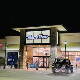 a car parked in front of a store