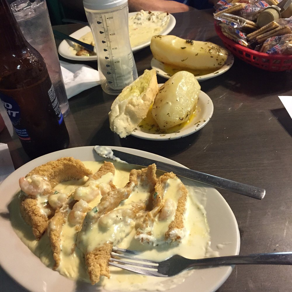 Bino's Seafood Restaurant - Catfish David: fried catfish smothered in a creamy crawfish sauce. Amazing! - Seafood Near Me - Bogalusa, Louisiana Bino's Seafood Restaurant - Catfish David: fried catfish smothered in a creamy crawfish sauce. Amazing! - Seafood Near Me - Bogalusa, Louisiana