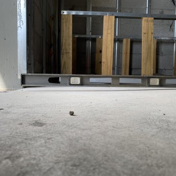 Wolfe Construction Group - This is a new slab no this is not a wheel chair ramp it a bathroom floor. Note the slope. - General Contractors Near Me Wolfe Construction Group - This is a new slab no this is not a wheel chair ramp it a bathroom floor. Note the slope. - General Contractors Near Me