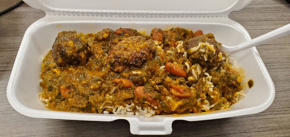 Noomy Cuisine Logo