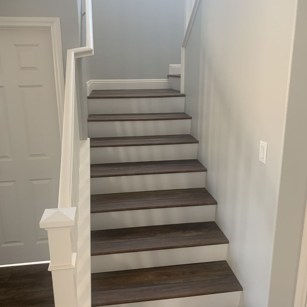 Hernandez Wholesale Flooring - Vinyl plank white face stairs - Flooring Near Me - Commerce, California Hernandez Wholesale Flooring - Vinyl plank white face stairs - Flooring Near Me - Commerce, California