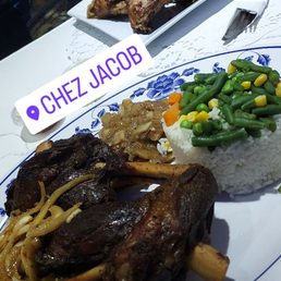 Lamb shank and brochette chicken with white rice and onions  delicious