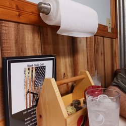 Black Gold Grill - Condiments, menus, paper towels and water that tastes good.