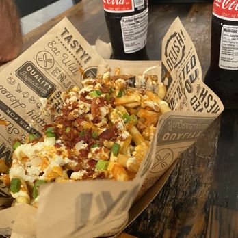Burger Rob’s - partially eaten buffalo ranch fries and bottled cokes from Mexico - Burgers Near Me - Titusville, Florida