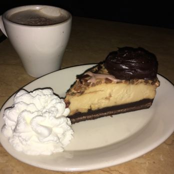 The Cheesecake Factory - The Caramel Turtle Cheesecake that we shared after the film, along with our cappuccinos.  OMG. - American Near Me - Albany, New York