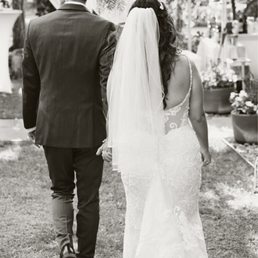 She did the bustle as well and hemmed it perfectly to where I wasn't tripping on my dress She did the bustle as well and hemmed it perfectly to where I wasn't tripping on my dress