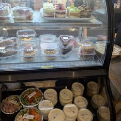 Salads, tubs of homemade cream cheese, bakery treats