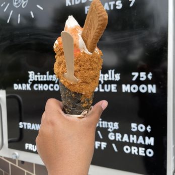 Cold Truth - Peach Ice Cream w/ Bischoff topping on a charcoal cone. - Ice Cream & Frozen Yogurt Near Me - Detroit, Michigan Cold Truth - Peach Ice Cream w/ Bischoff topping on a charcoal cone. - Ice Cream & Frozen Yogurt Near Me - Detroit, Michigan